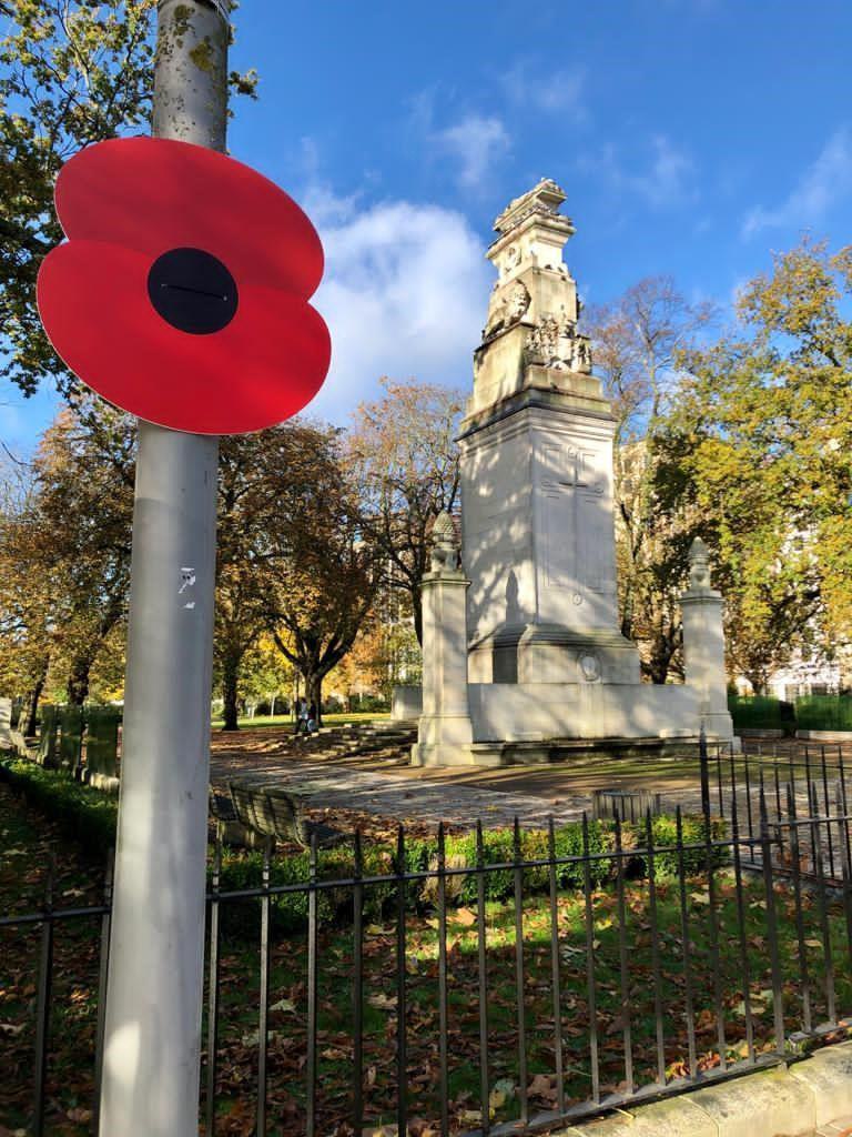Southampton War Memorial with poppy in the foreground