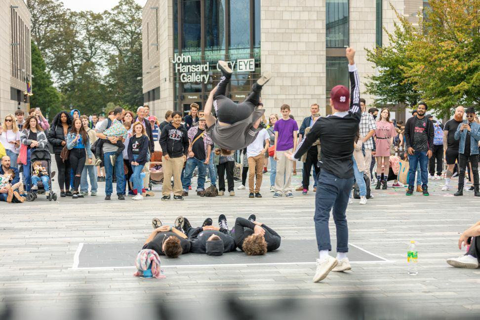 Street performers performing outside John Hansard Gallery