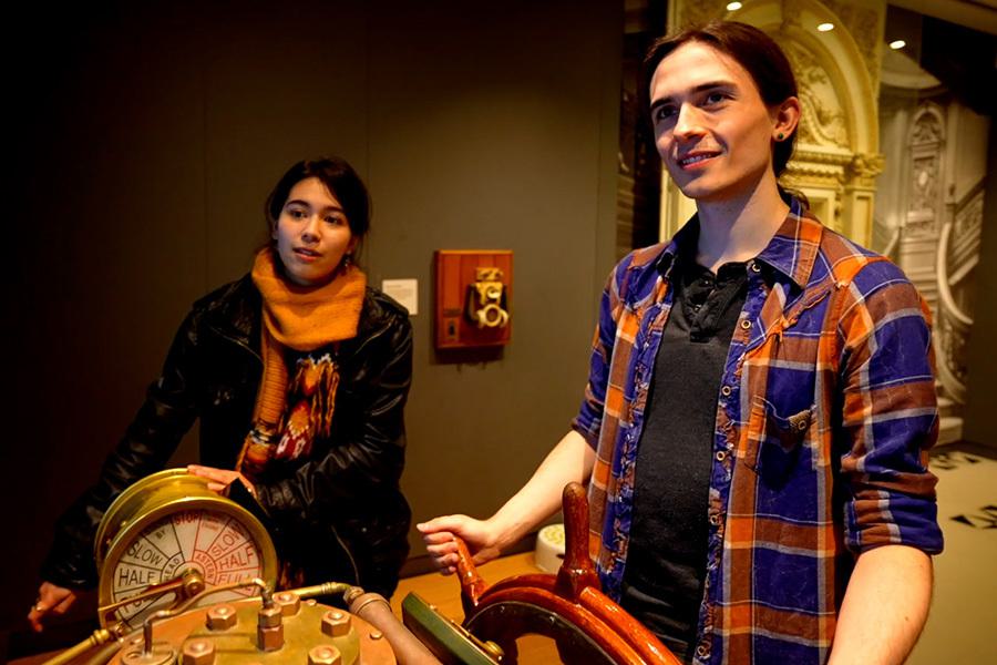 Two people looking at exhibits in SeaCity Museum