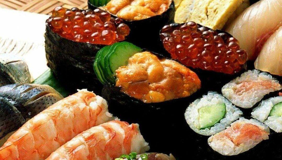 Colourful sushi assortment platter with sashimi shrimp and cucumber rolls from Nara 2024 01 17 155325 qfrk