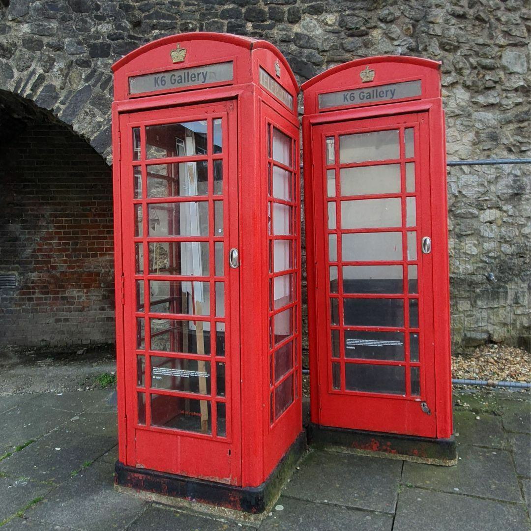 Two red telephone boxes