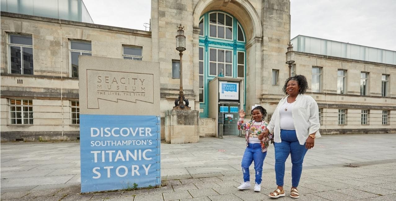Woman and child stood outside SeaCity Museum