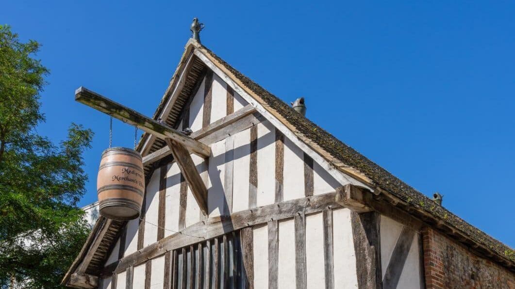 Medieval Merchant House frontage on a bright blue sky summer day