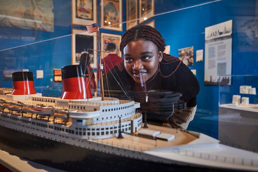 Young girl looking at Titanic model in SeaCity Museum