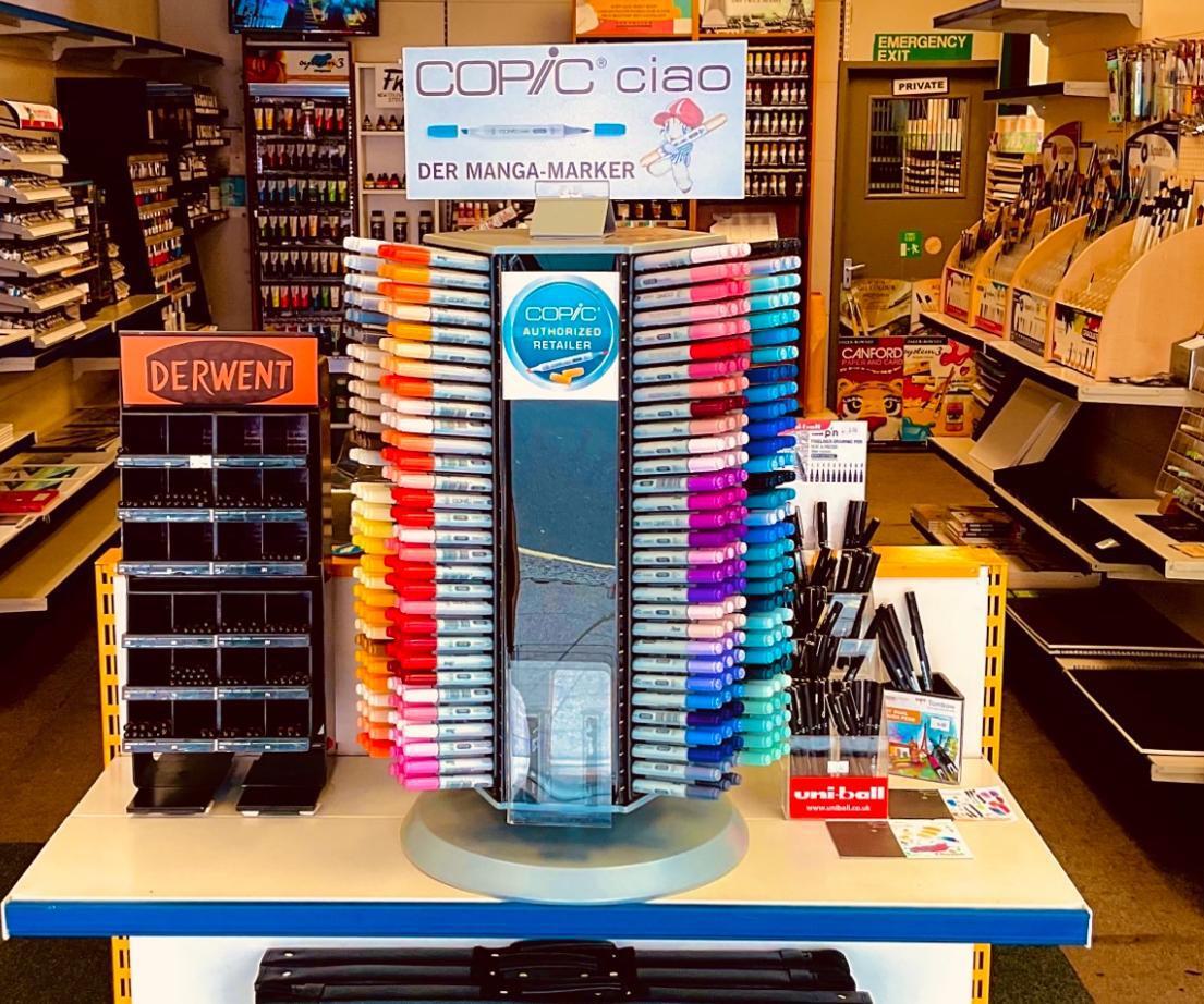 A display of coloured pens within an art supply shop